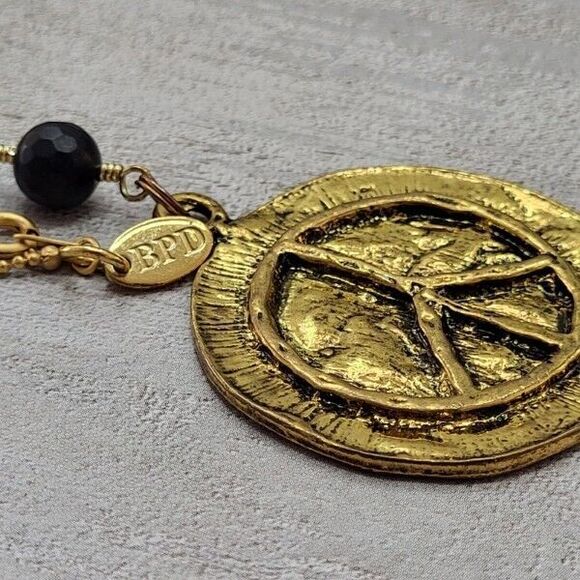 BPD Betsy Pittard Designs Goldtone Hammered Peace Symbol 35"  Y-drop Necklace - Picture 2 of 5
